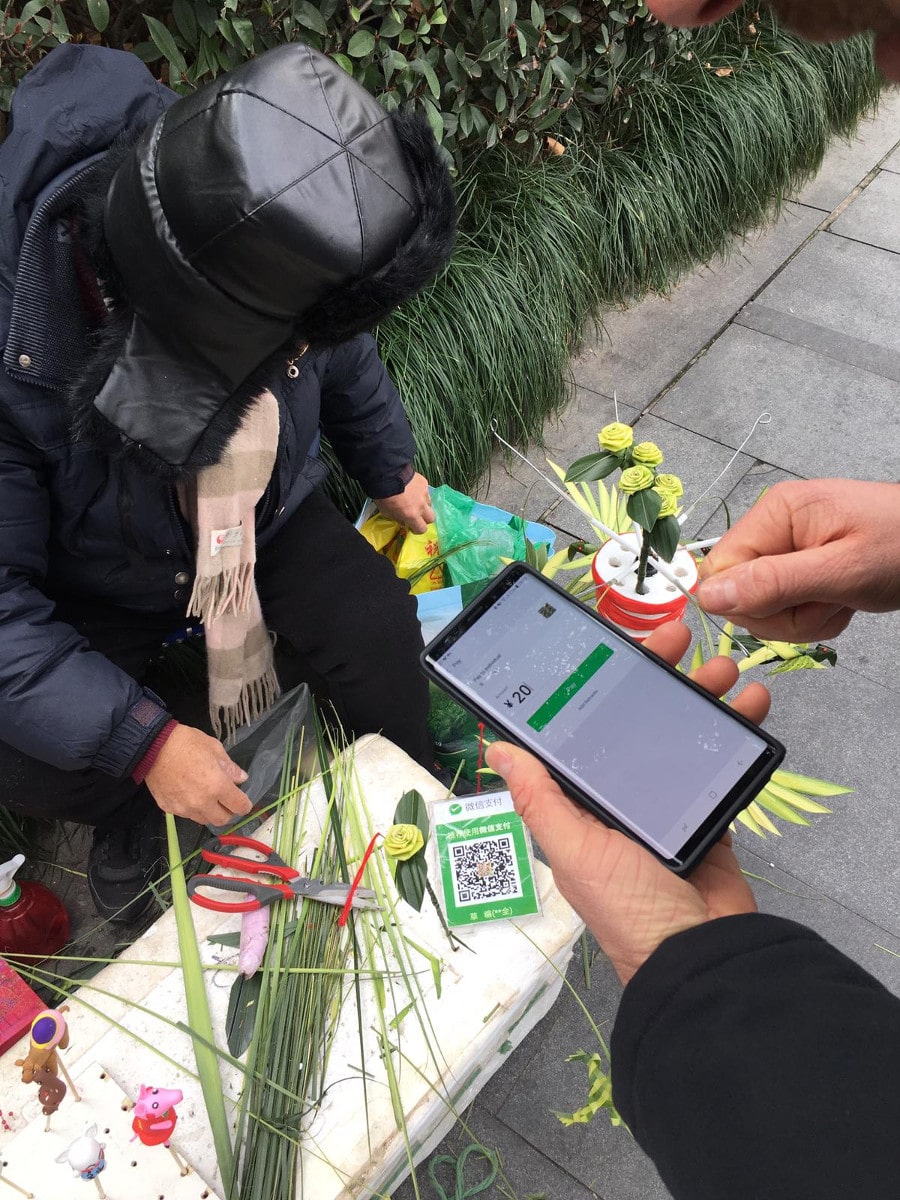 Straßenhändler bezahlen mit WeChat